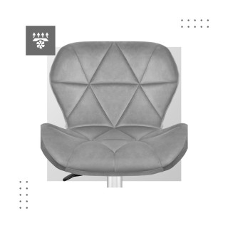 Velúrové kreslo sivej farby s prešívaním