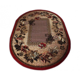 Oválny koberec v červenej farbe