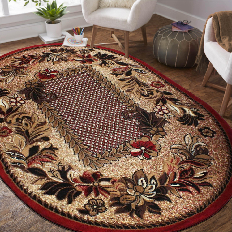 Oválny koberec v červenej farbe