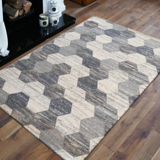 Koberec so vzorom včelích plástov v sivej farbe