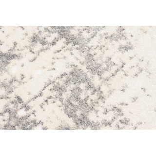 Vzorovaný koberec v jemných farbách