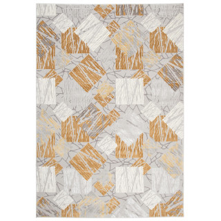 Žltý koberec s geometrickým vzorom