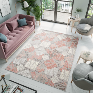 Koberec s geometrickým vzorom v ružovej farbe