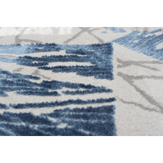 Koberec s modrým geometrickým vzorom