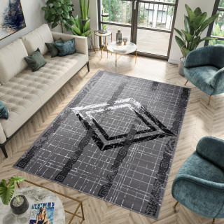 Sivý koberec so vzorom