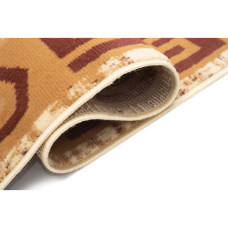 Koberec v krémovej farbe so vzorom