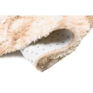 Okrúhly béžový koberec