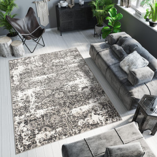 Tmavosivý koberec s moderným vzorom