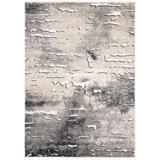 Koberec v krémovej farbe so vzorom