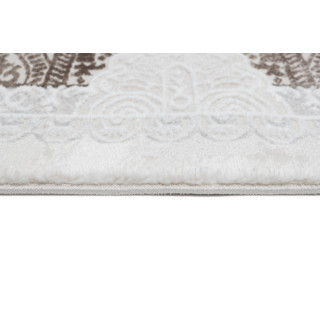 Krémovo-hnedý koberec so vzorom