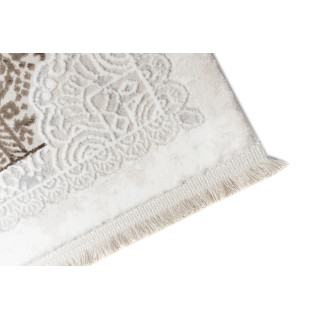 Krémovo-hnedý koberec so vzorom