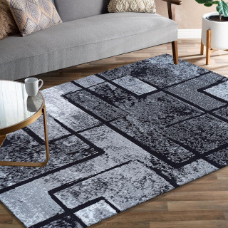 Sivý koberec s moderným vzorom