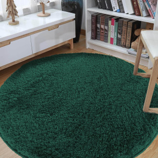 Okrúhly shaggy koberec v zelenej farbe