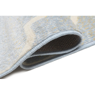 Koberec v jemných farbách so vzorom