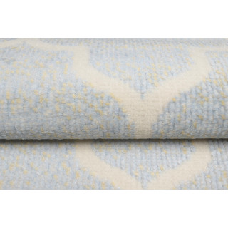 Koberec v jemných farbách so vzorom