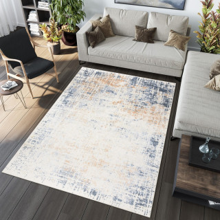 Koberec so vzorom v jemných farbách