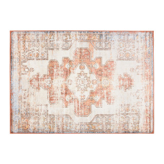 Krémový koberec s ornamentom