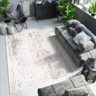 Vzorovaný koberec krémovej farby