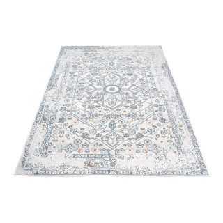 Krémový koberec s rastlinným motívom