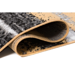 Moderný žltý koberec