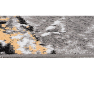 Sivo-žltý koberec so vzorom