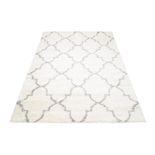 Vzorovaný shaggy koberec v krémovej farbe