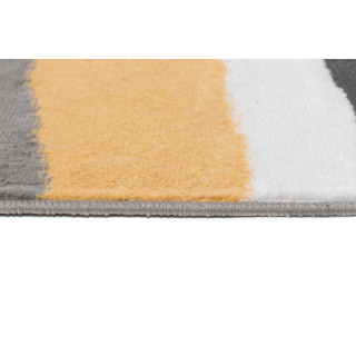 Moderný sivo-žltý koberec so vzorom