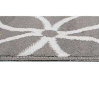 Sivo-žltý koberec so vzorom