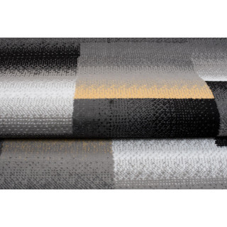 Sivý koberec s jednoduchým vzorom