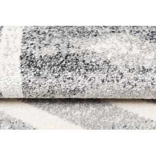 Štýlový sivý koberec so vzorom