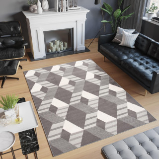 Koberec s jednoduchým vzorom sivej farby