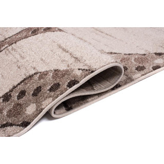 Koberec v béžovej farbe so vzorom