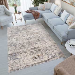 Vzorovaný koberec v krémovej farbe