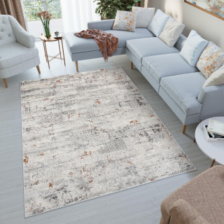 Moderný vzorovaný koberec v krémovej farbe