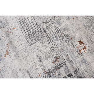 Moderný vzorovaný koberec v krémovej farbe