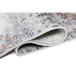 Moderný vzorovaný koberec v krémovej farbe