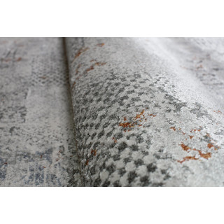 Moderný vzorovaný koberec v krémovej farbe