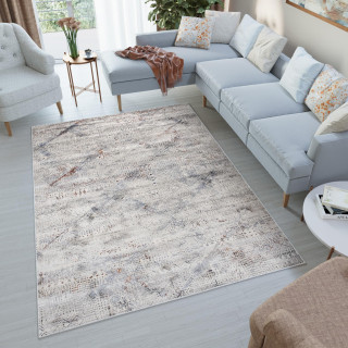 Krémový moderný koberec so vzorom