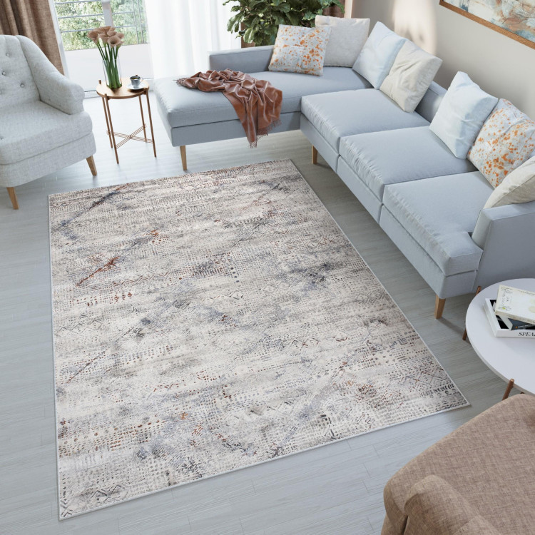 Krémový moderný koberec so vzorom