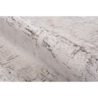 Krémový koberec so vzorom