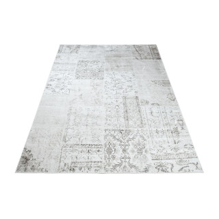 Krémovo-strieborný koberec so vzorom