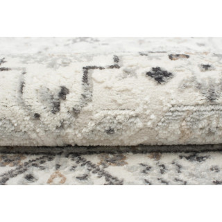 Koberec v jemných farbách so vzorom