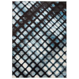 Modrý koberec s geometrickým vzorom