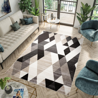 Vzorovaný béžový koberec