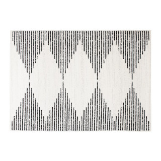 Krémový koberec s čiernym vzorom