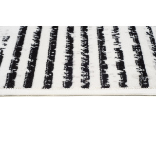 Krémový koberec s čiernym vzorom