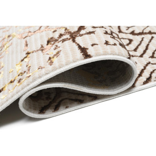 Krem preproga z zlatim vzorcem