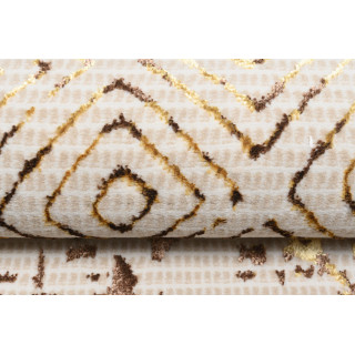 Krem preproga z zlatim vzorcem