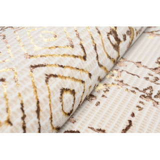 Krem preproga z zlatim vzorcem