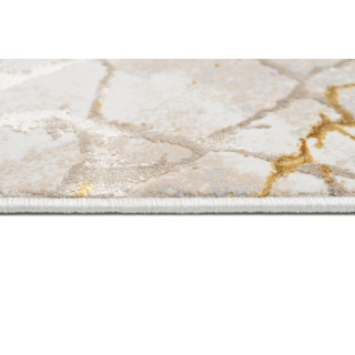 Preproga z zlatim vzorcem